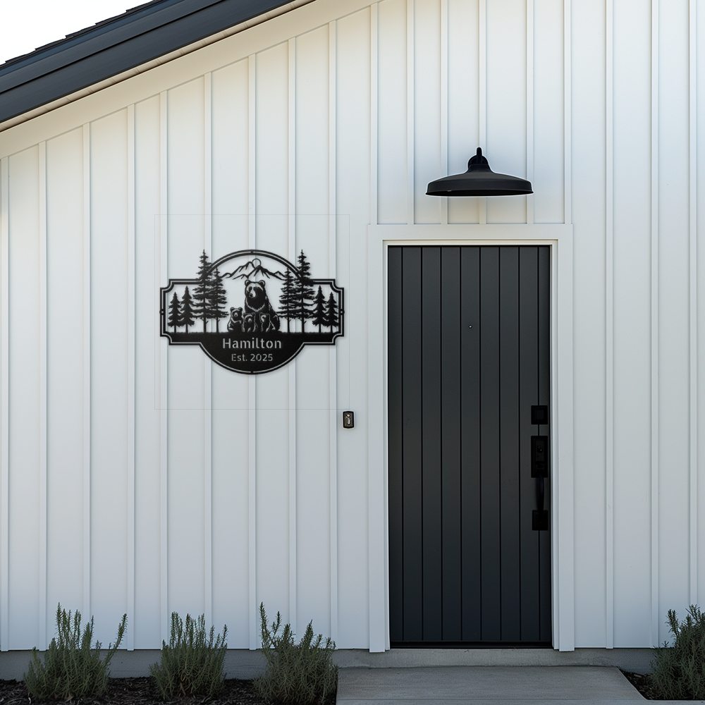 Personalized Bear Family Metal Sign – Custom Cabin & Family Name Wall Art in black against a white board and batten modern cabin entryway.