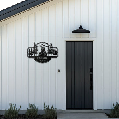 Personalized Bear Family Metal Sign – Custom Cabin & Family Name Wall Art in black against a white board and batten modern cabin entryway.