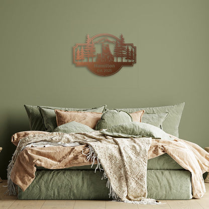 Personalized Bear Family Metal Sign – Custom Cabin & Family Name Wall Art in copper against a green wall hanging above a messy bed.